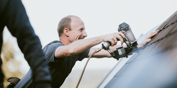 Man roofing